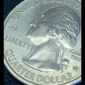 TALL GRASS PRARIE QUARTER W MINT MARK W/ V75
